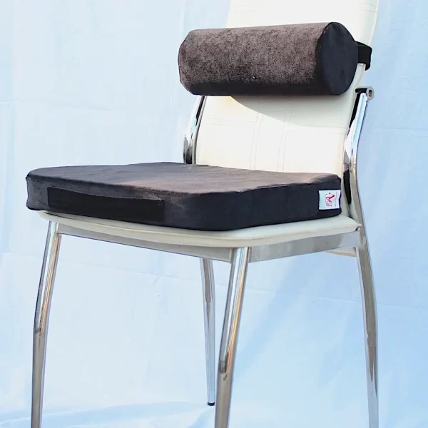 orthopedic seat cushion placed on a chair